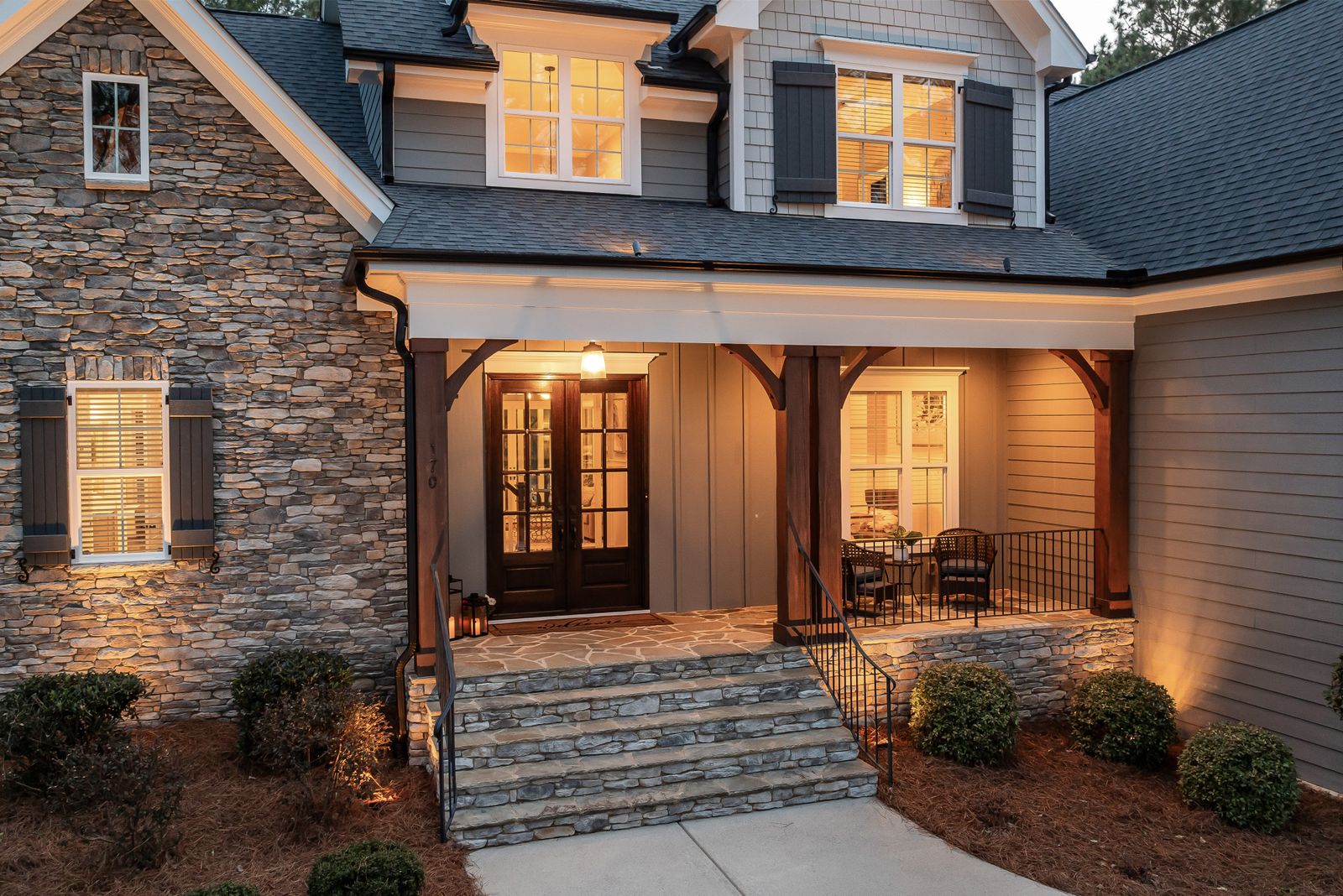 Front porch of a stone-faced house