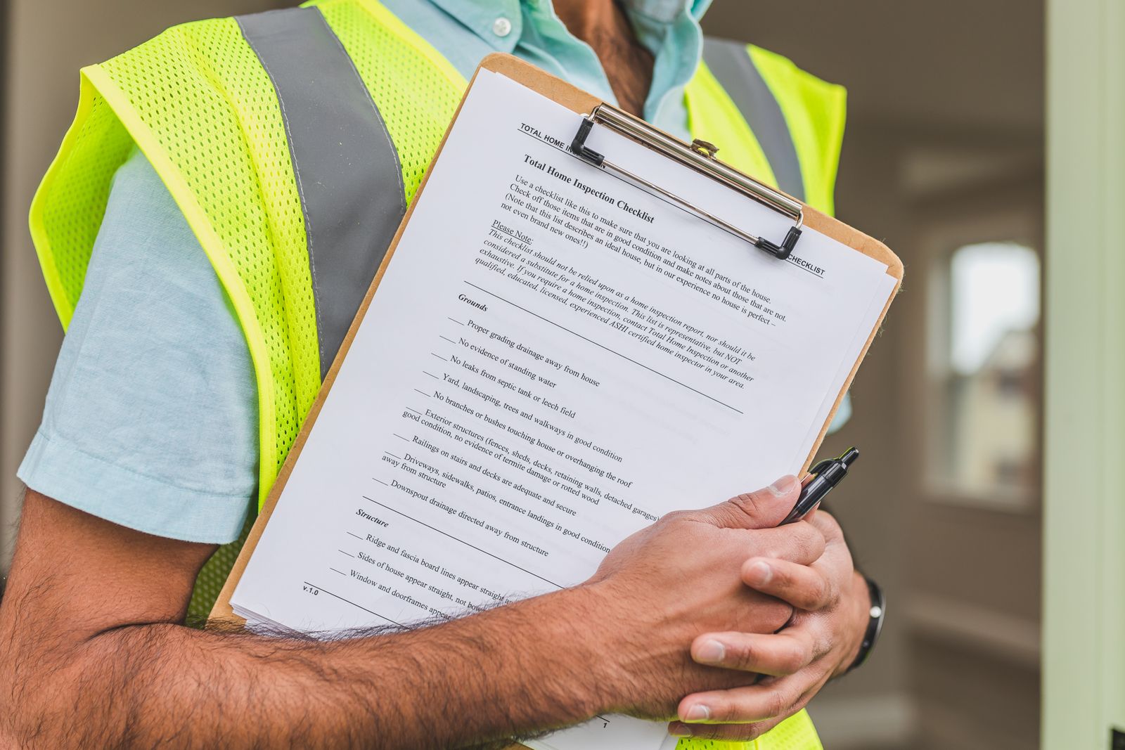 Home inspector working through a checklist